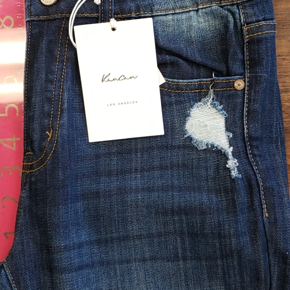 Mid-Rise Distressed Denim - Picture 4 of 9